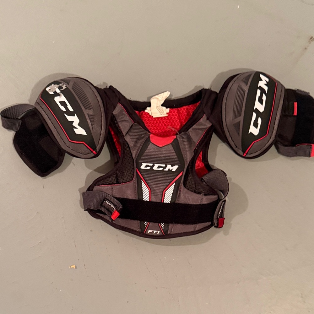 CCM Red and Black Shoulder Gear